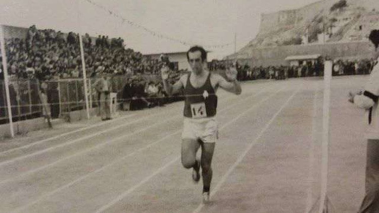 &laquo;Έ&phi;&upsilon;&gamma;&epsilon;&raquo; &omicron; &Nu;ί&kappa;&omicron;&sigmaf; &Psi;&alpha;&rho;&omicron;&mu;&iota;&chi;&alpha;&lambda;ά&kappa;&eta;&sigmaf; - &Sigma;&upsilon;&lambda;&lambda;&upsilon;&pi;&eta;&tau;ή&rho;&iota;&alpha; &alpha;&pi;ό &tau;&omicron;&nu; &Pi;&alpha;&nu;&alpha;&theta;&eta;&nu;&alpha;ϊ&kappa;ό